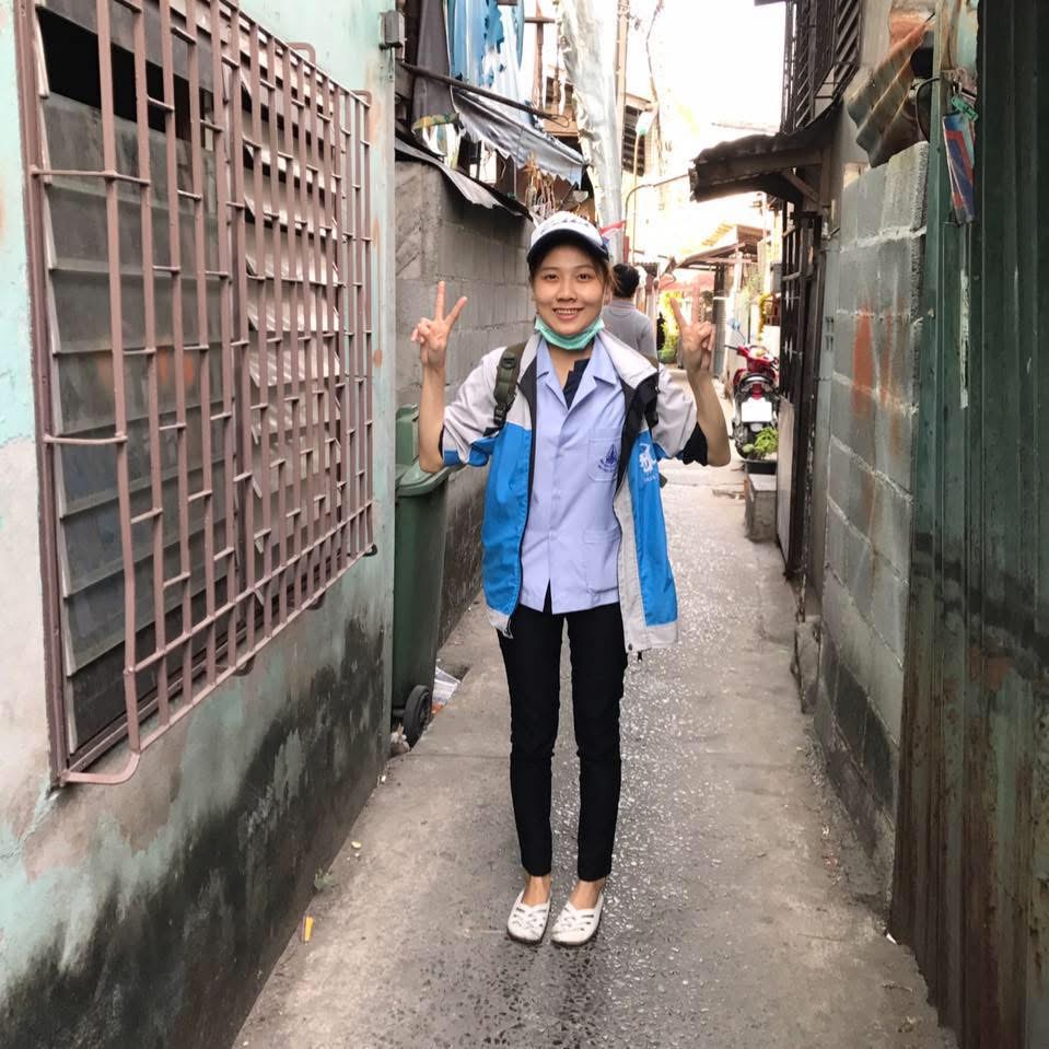 Kukkik in nursing uniform on community rounds